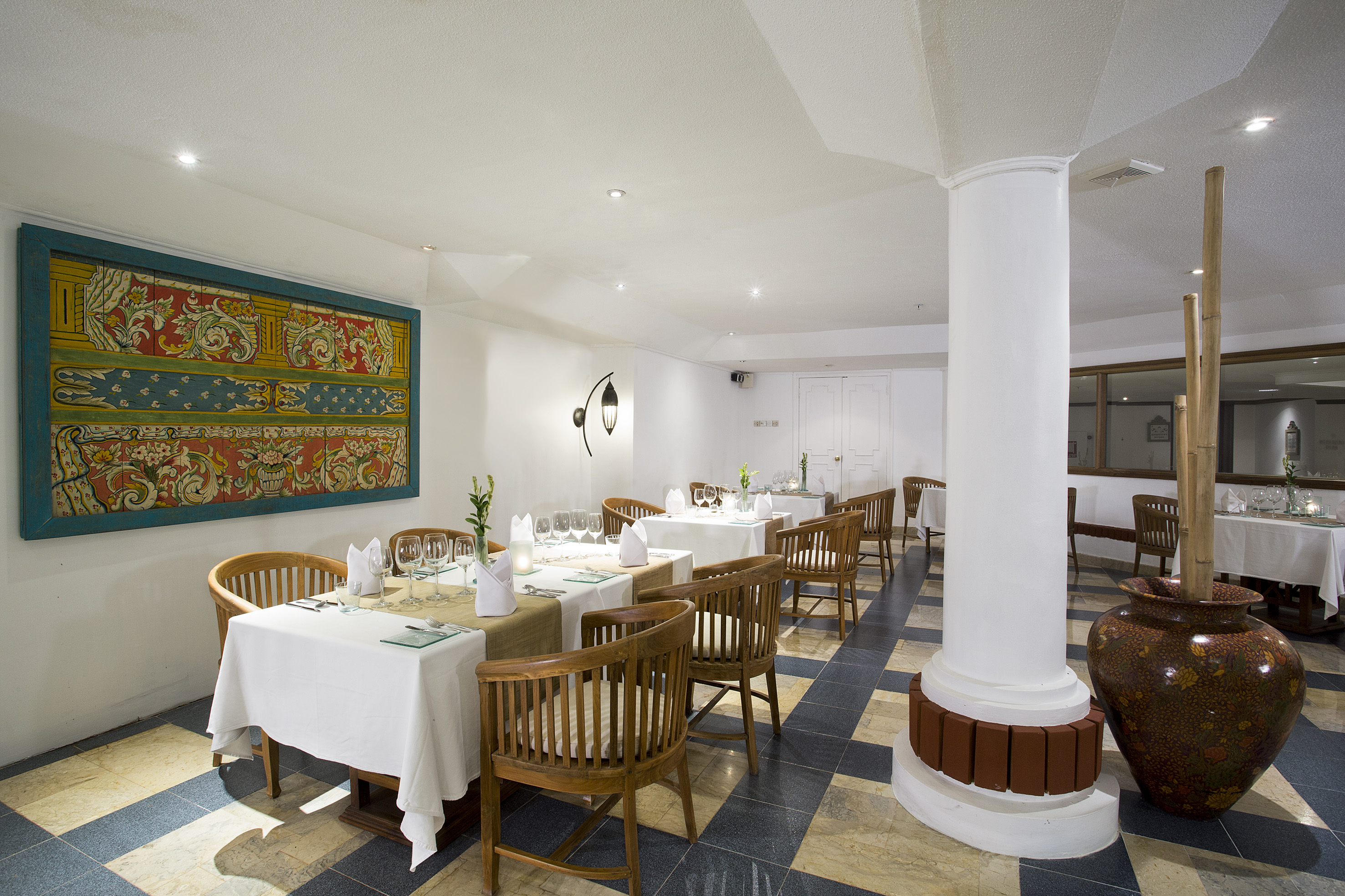a room with tables and chairs