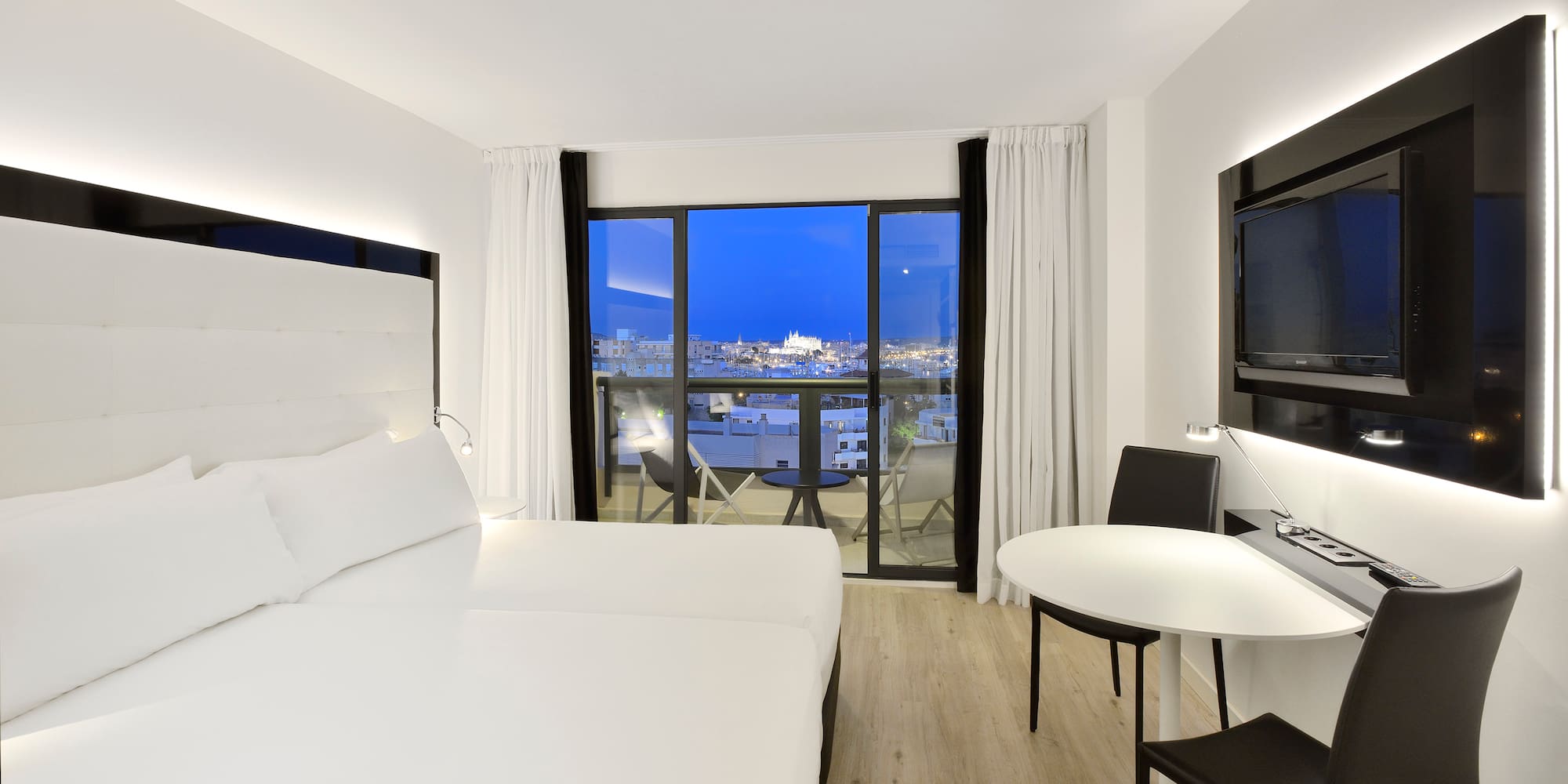 a room with a television and a table