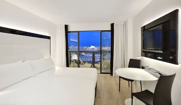 a room with a television and a table