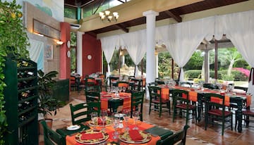 a restaurant with tables and chairs