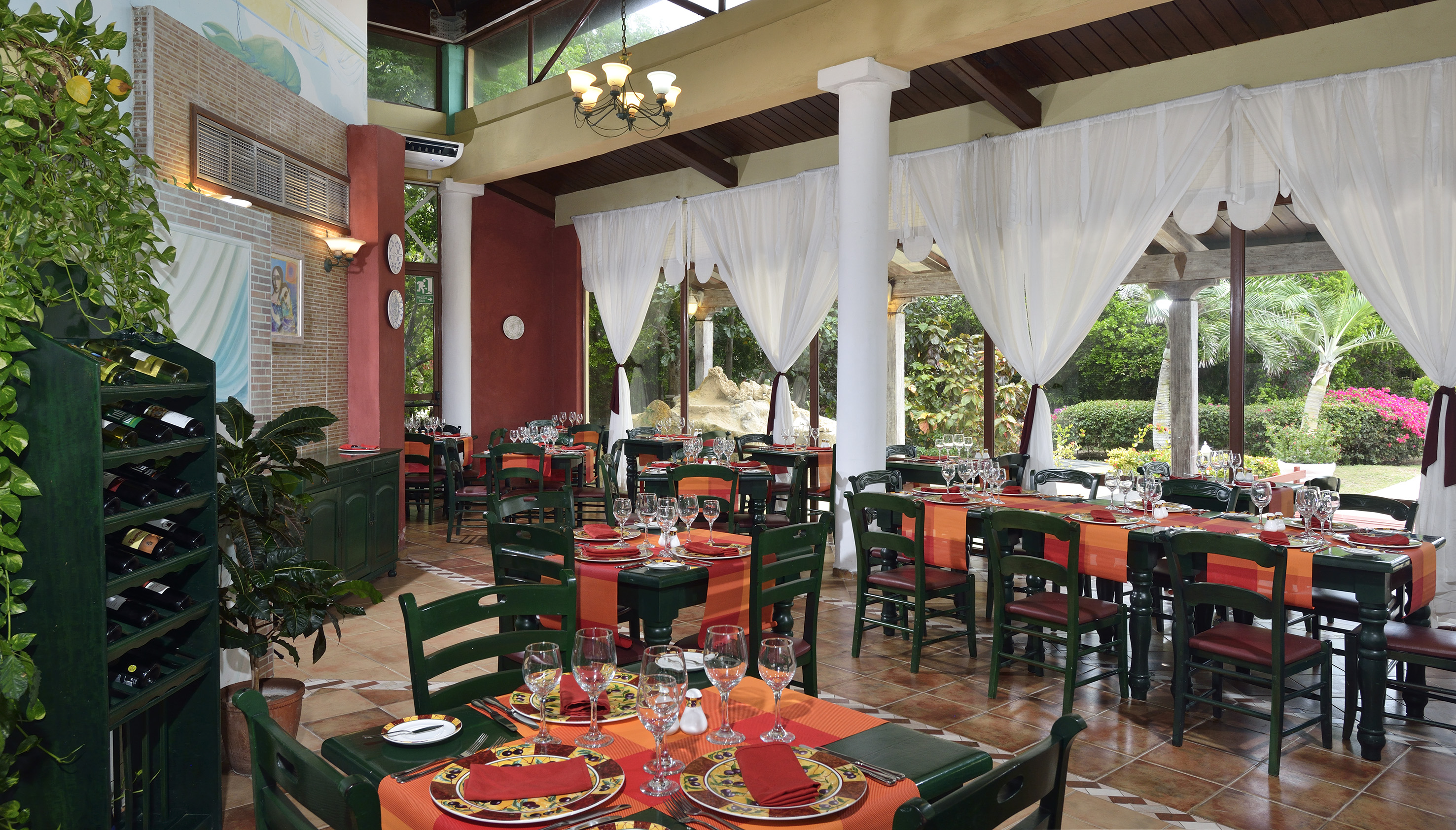 a restaurant with tables and chairs