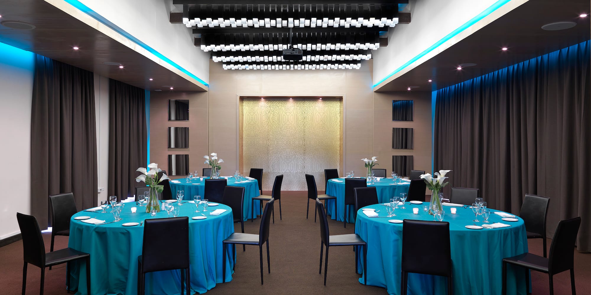 a room with tables and chairs