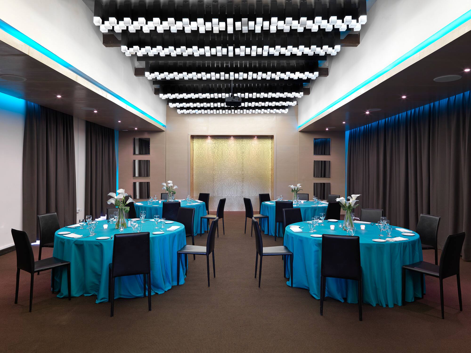 a room with tables and chairs