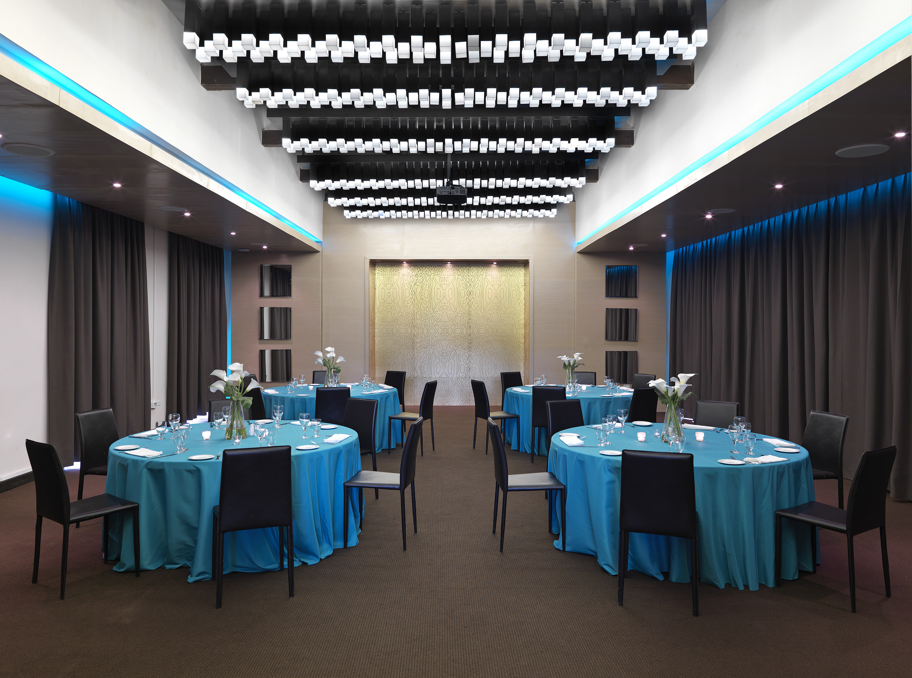 a room with tables and chairs