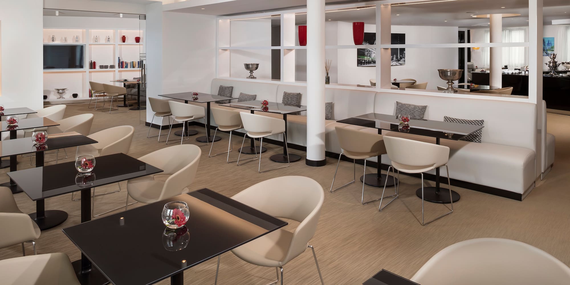 a room with tables and chairs