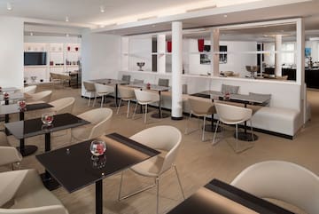 a room with tables and chairs