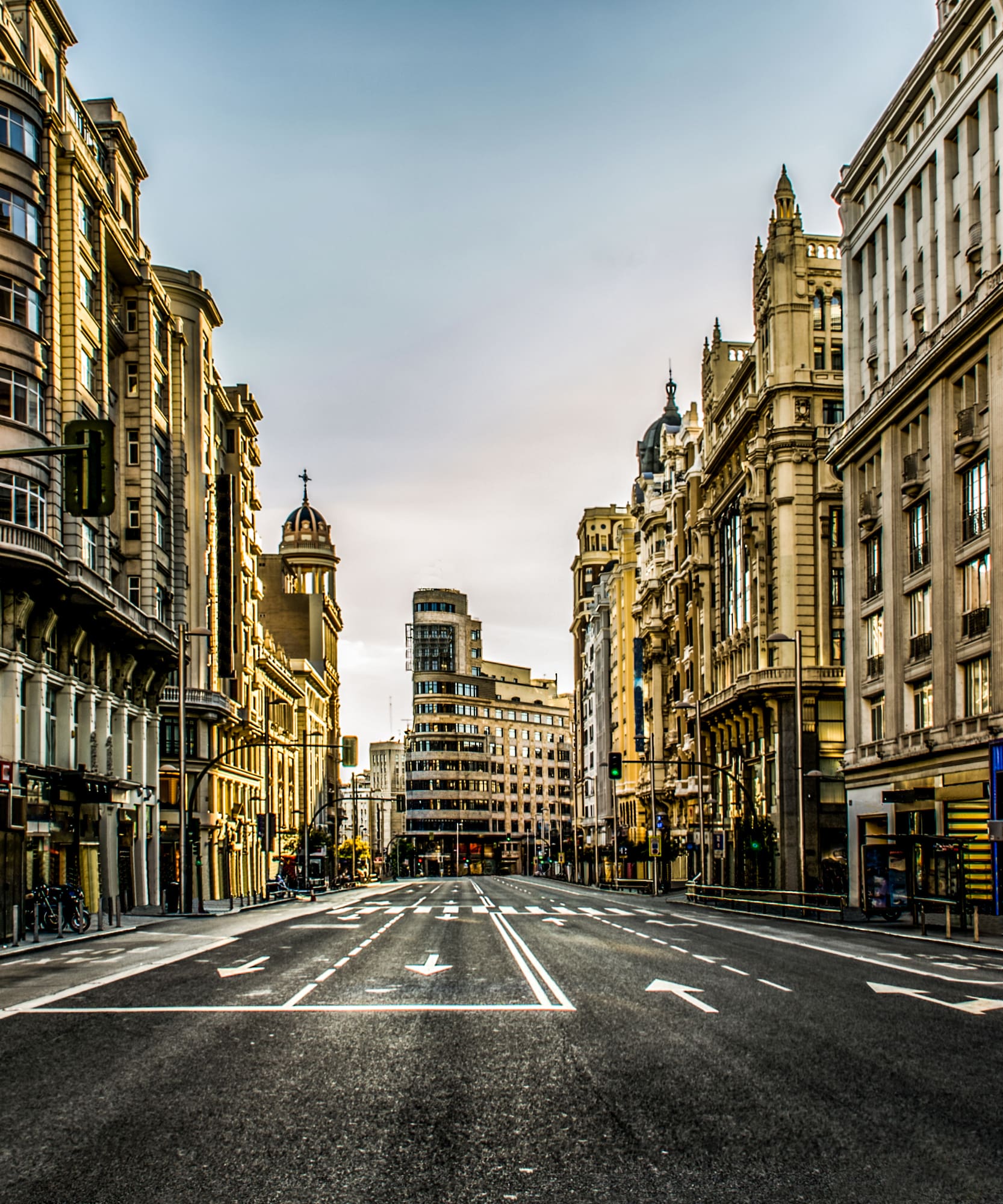 a street with buildings in the background