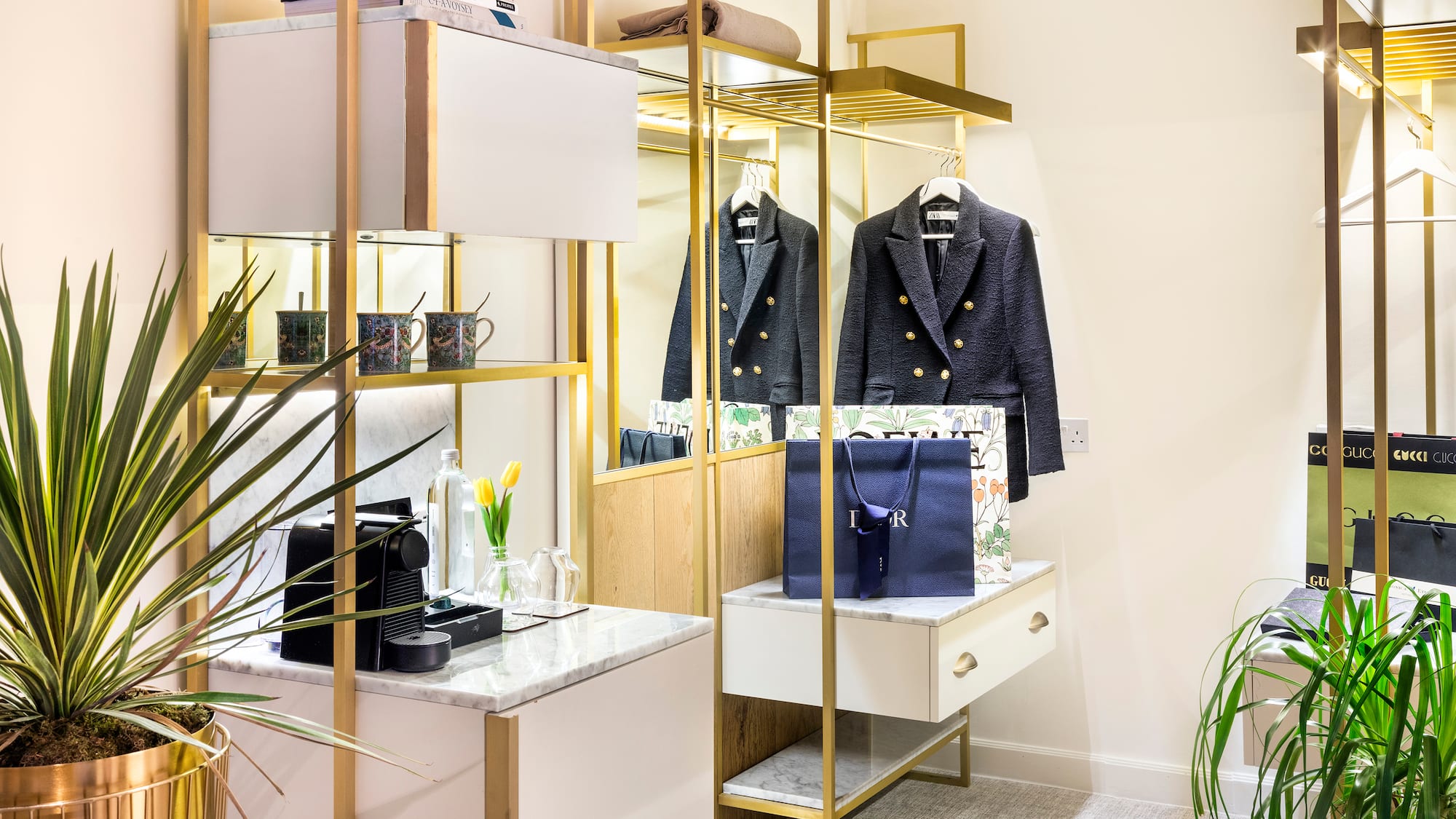 a room with a closet and a mirror