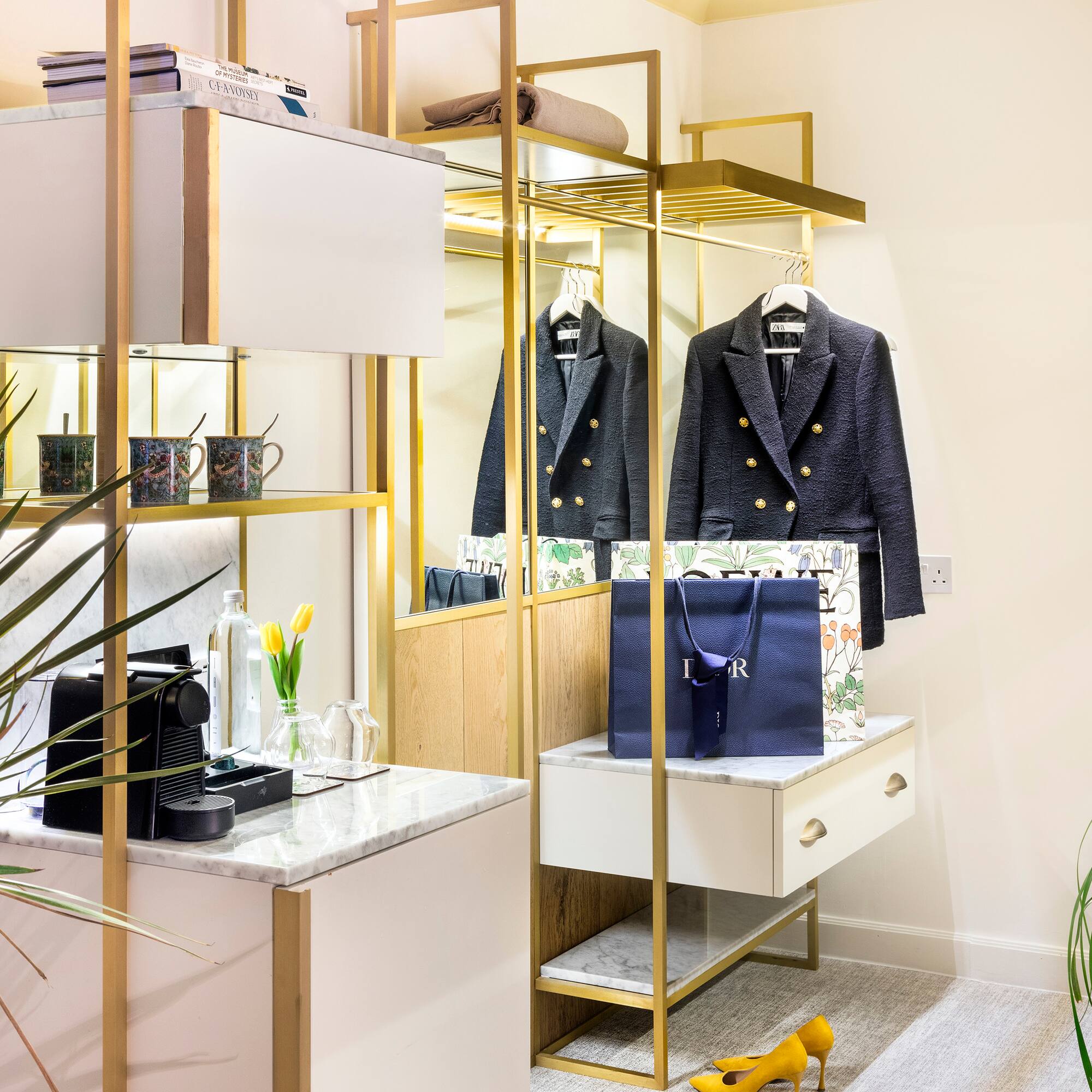 a room with a closet and a mirror