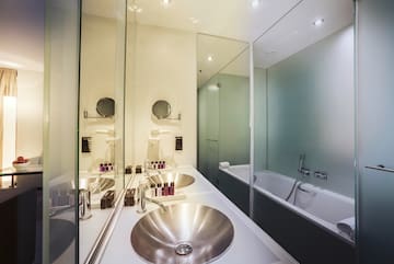 a bathroom with a sink and tub