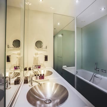 a bathroom with a sink and tub