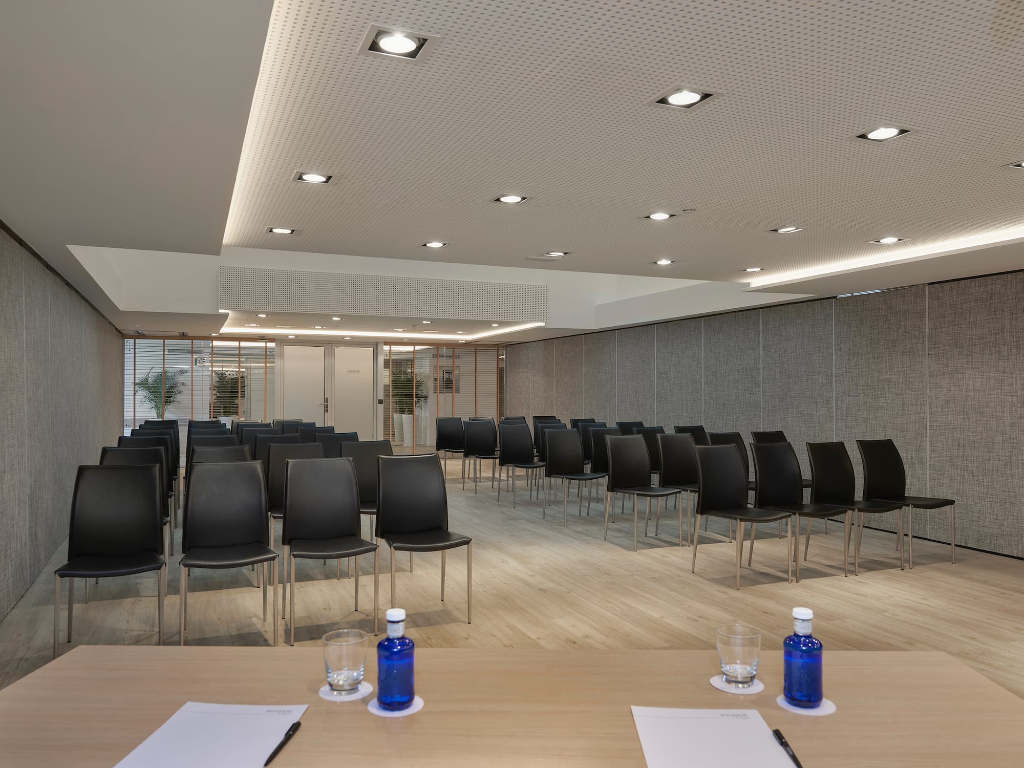 a room with chairs and a table