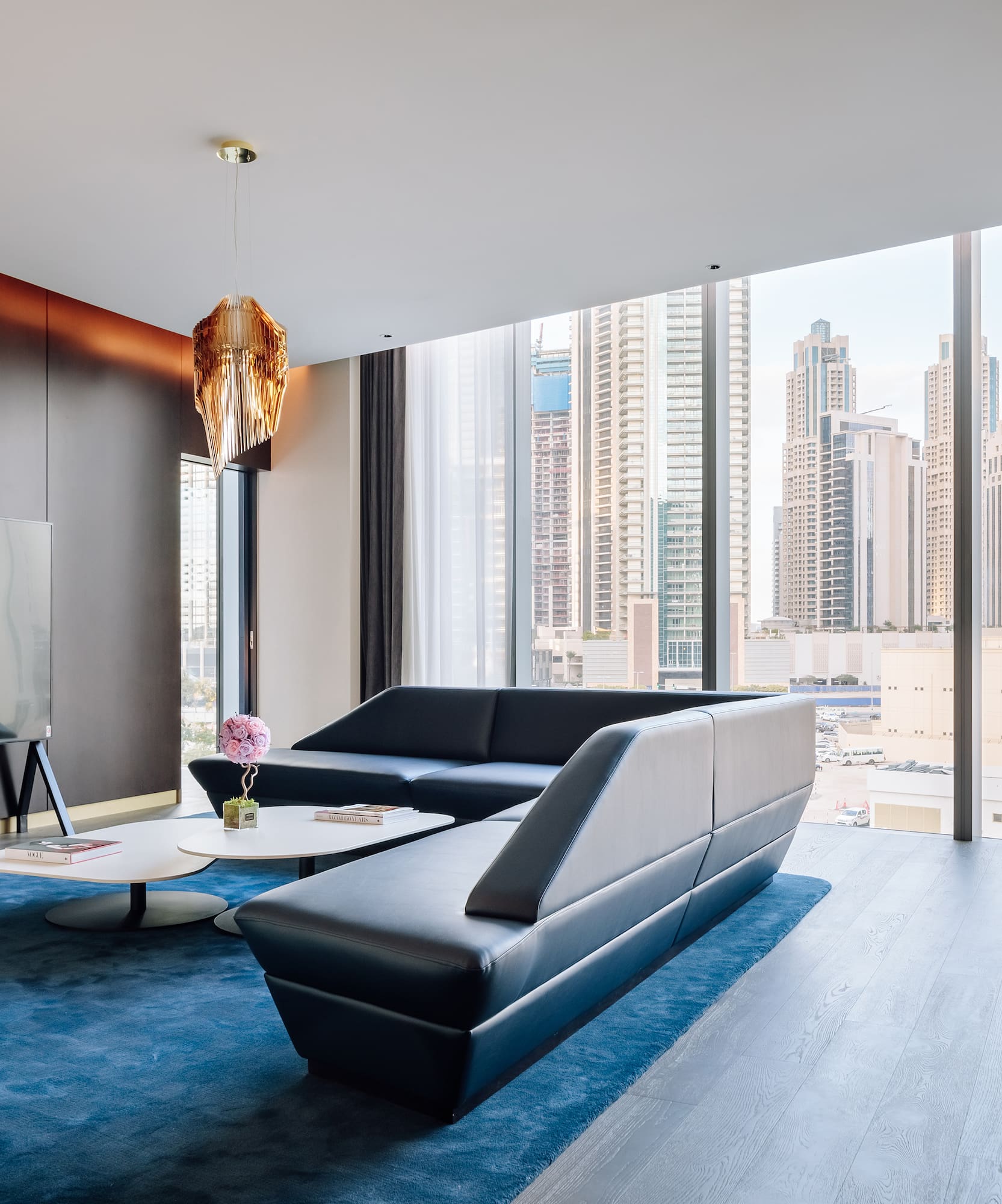 a living room with a couch and a tv