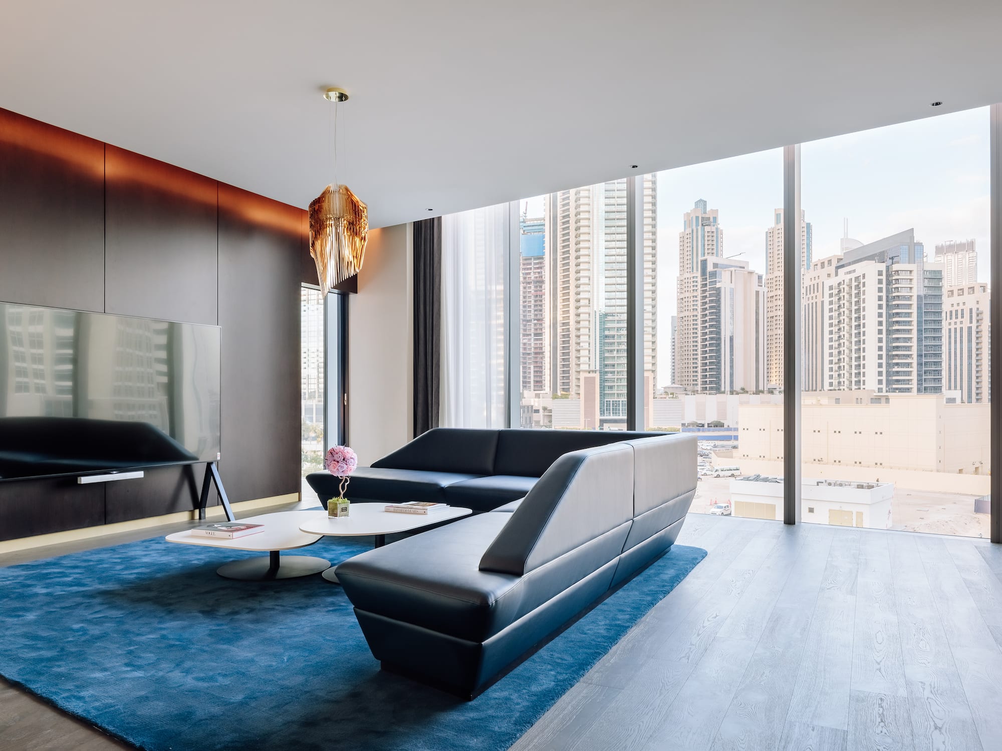 a living room with a couch and a tv