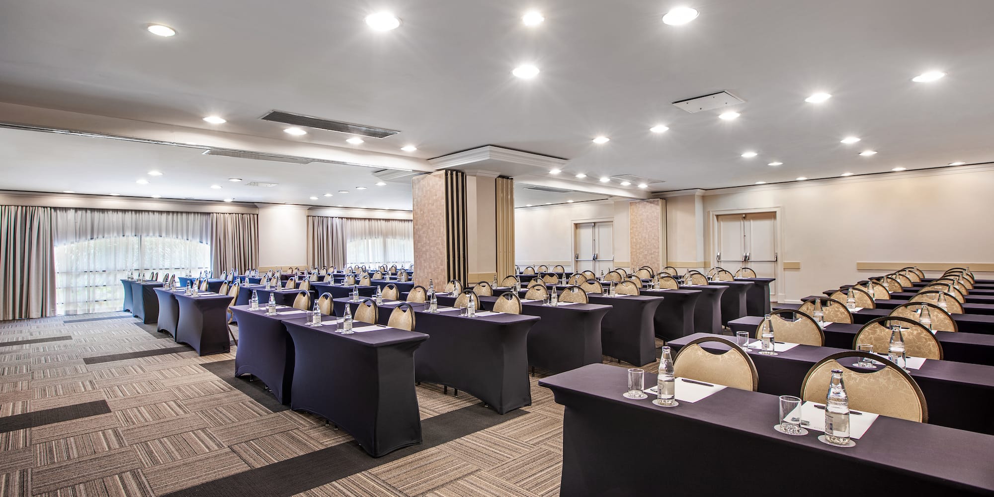 a room with tables and chairs