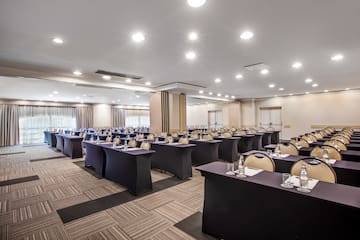 a room with tables and chairs
