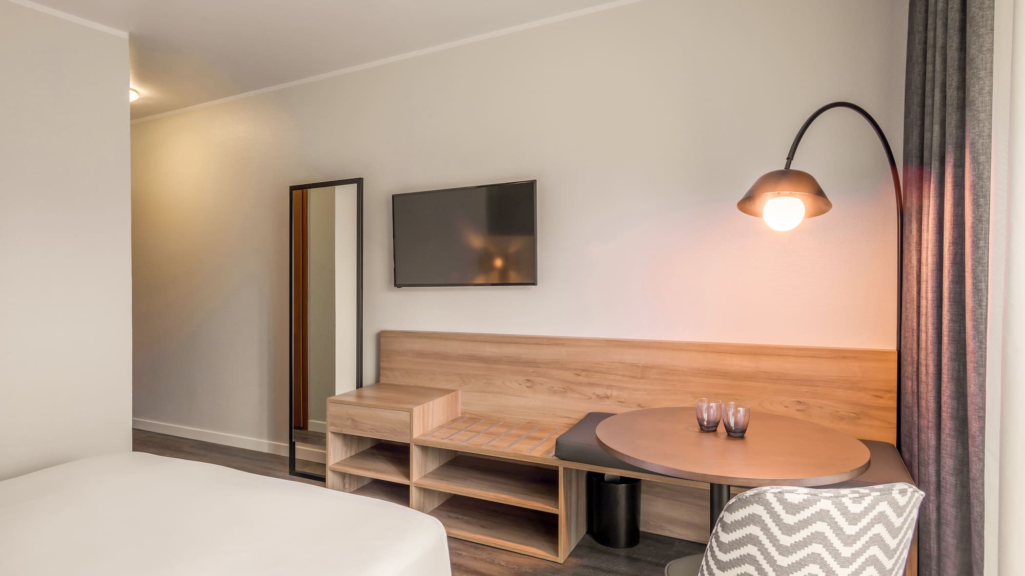 a room with a bed and a table