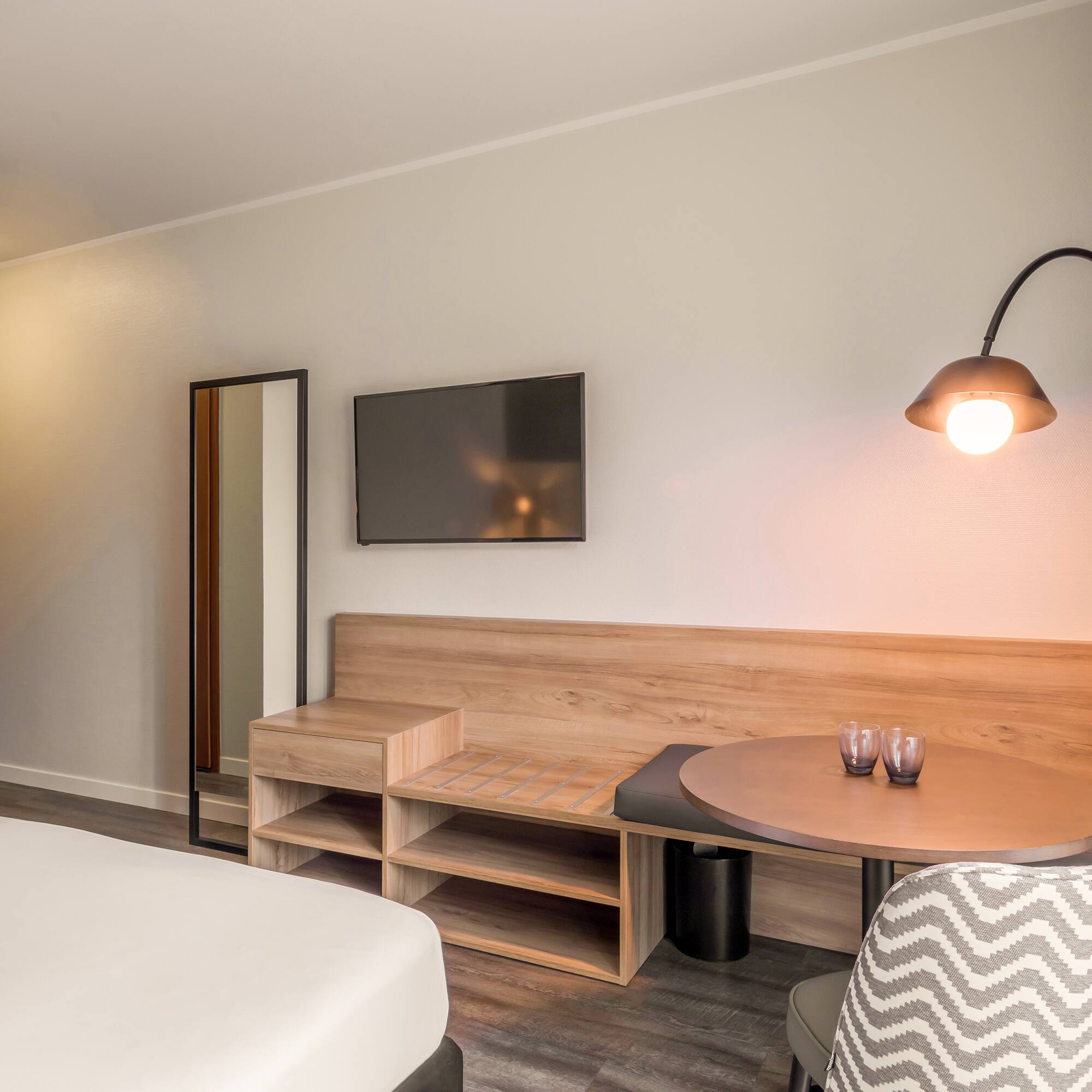 a room with a bed and a table