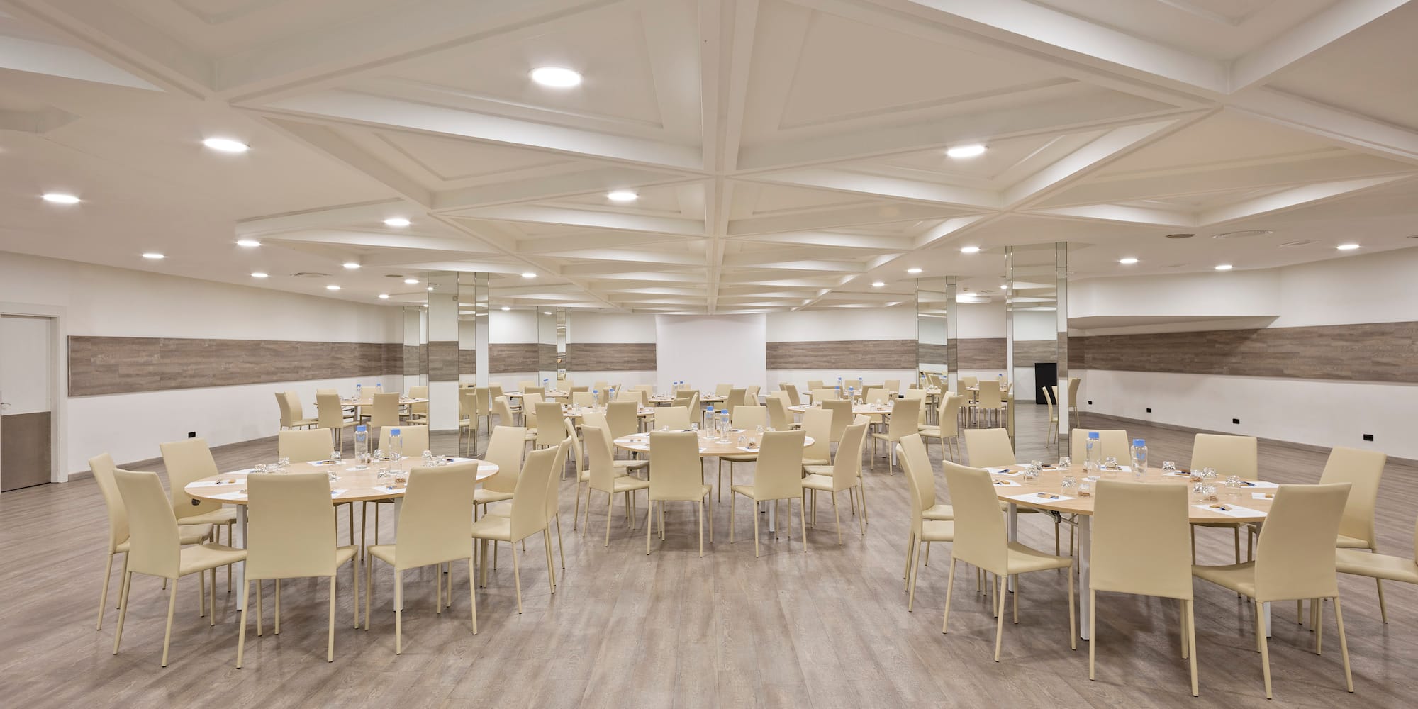 a room with tables and chairs