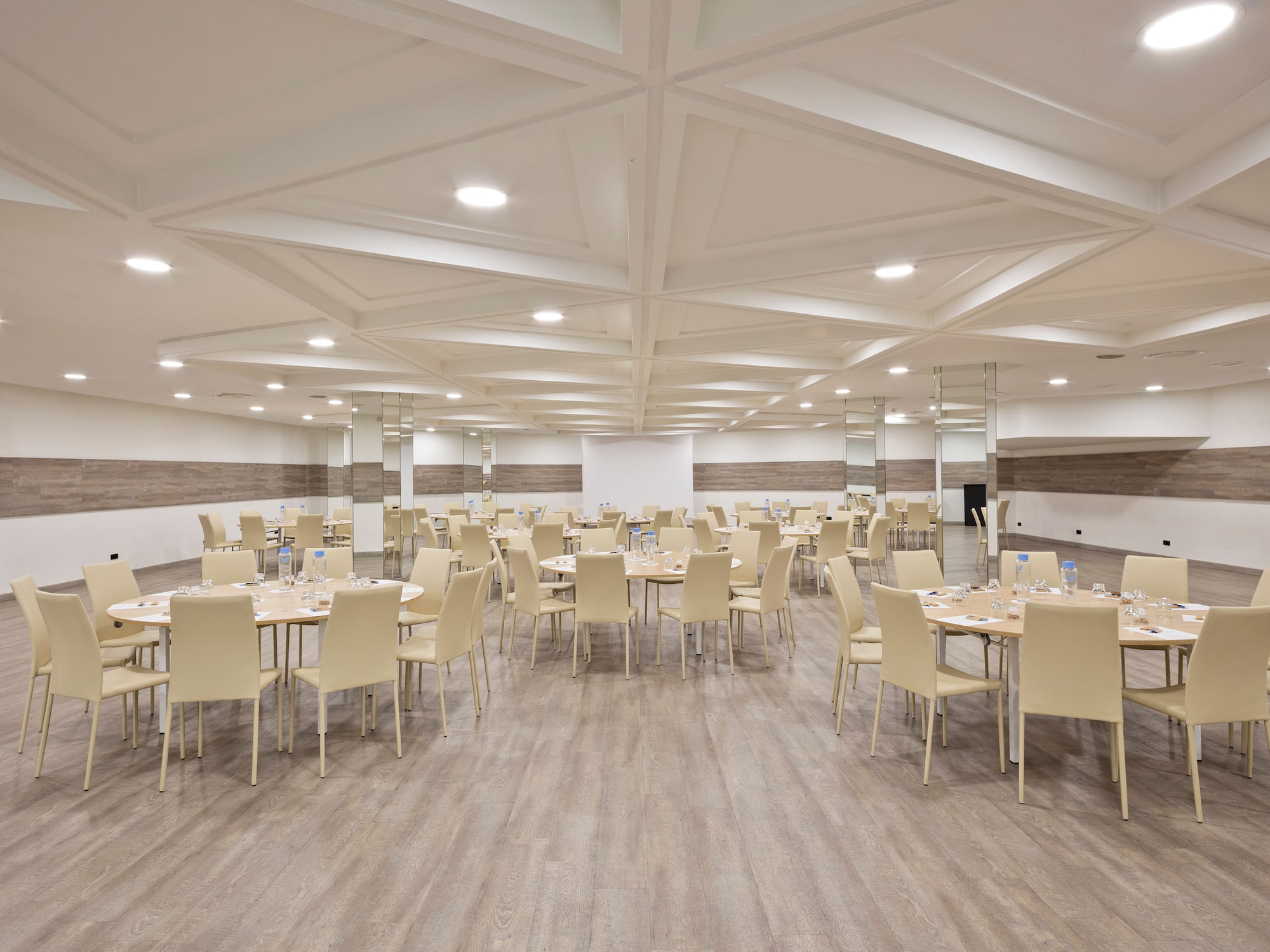 a room with tables and chairs