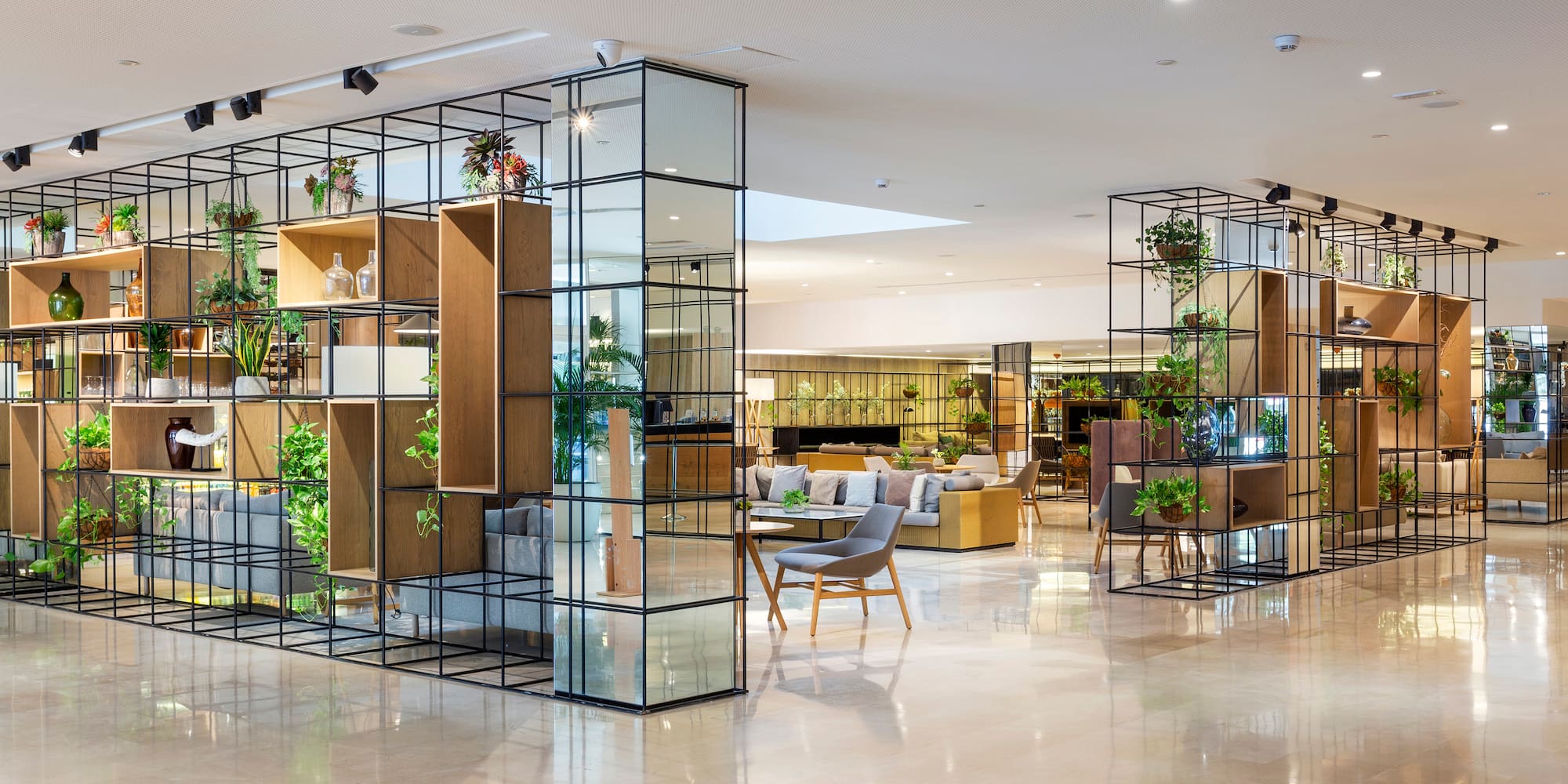 a room with glass walls and shelves