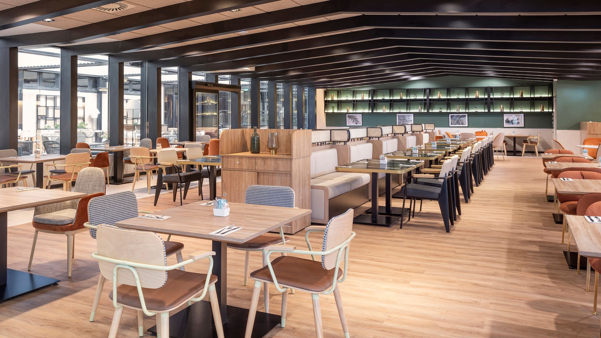 a restaurant with tables and chairs