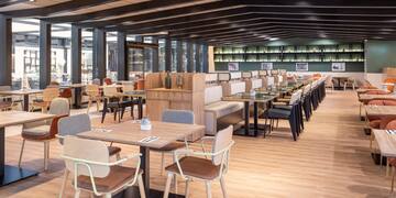 a restaurant with tables and chairs