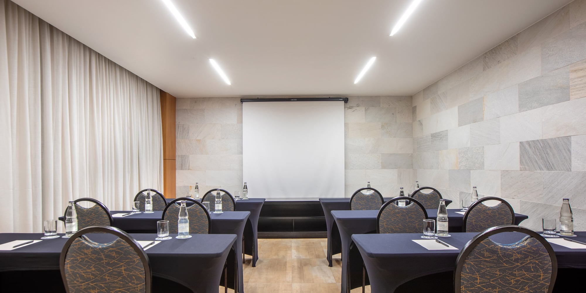 a room with tables and chairs