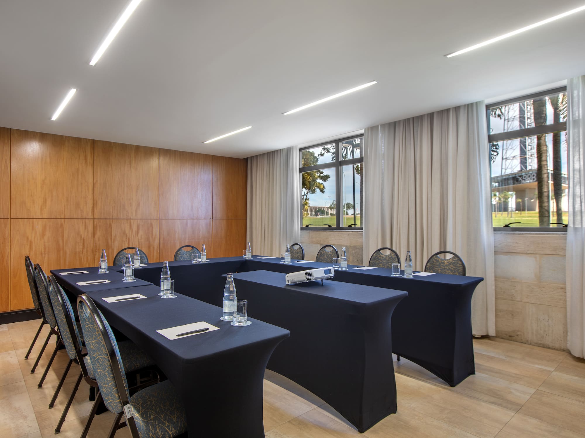 a room with tables and chairs