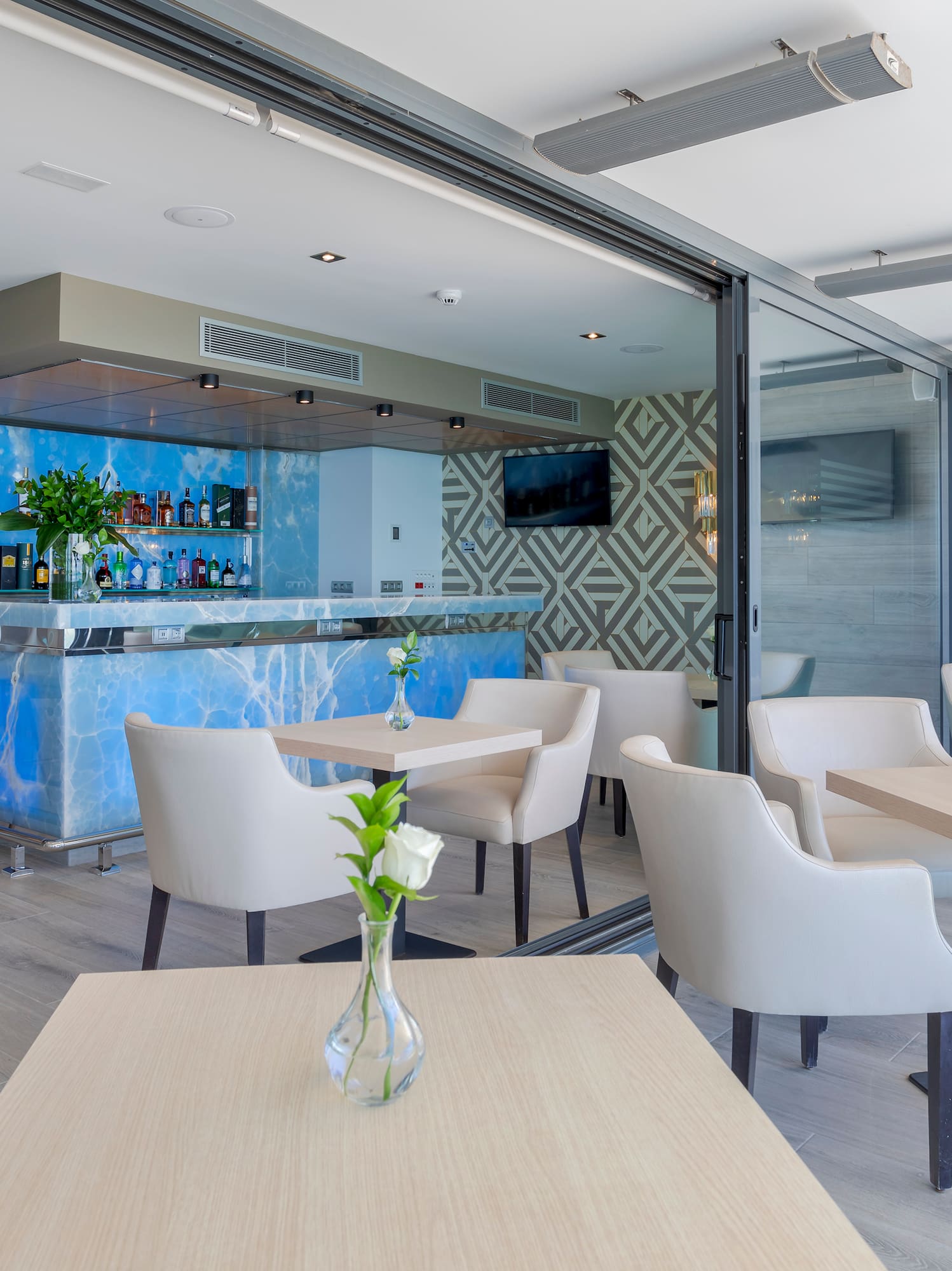 a room with tables and chairs