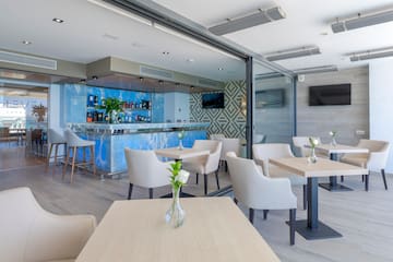 a room with tables and chairs