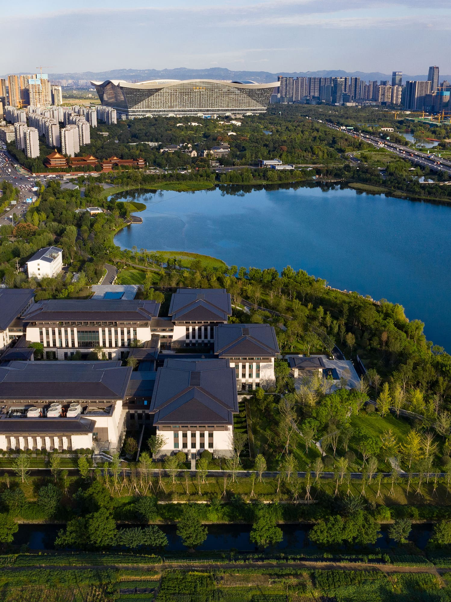 a large building next to a body of water