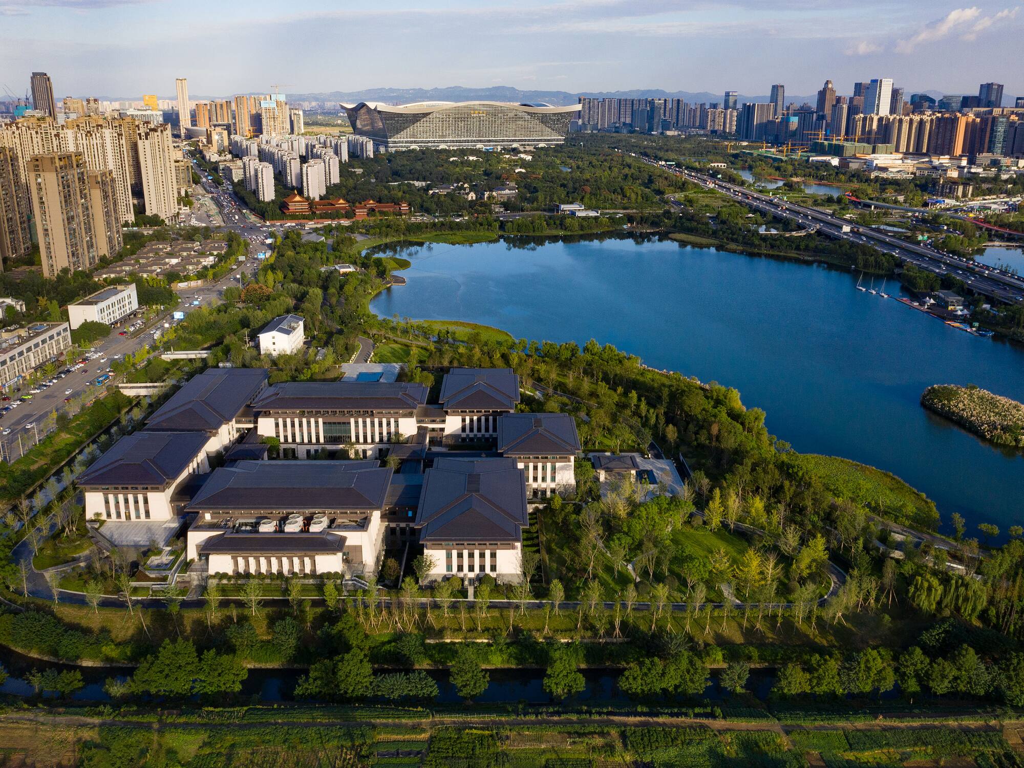 a large building next to a body of water