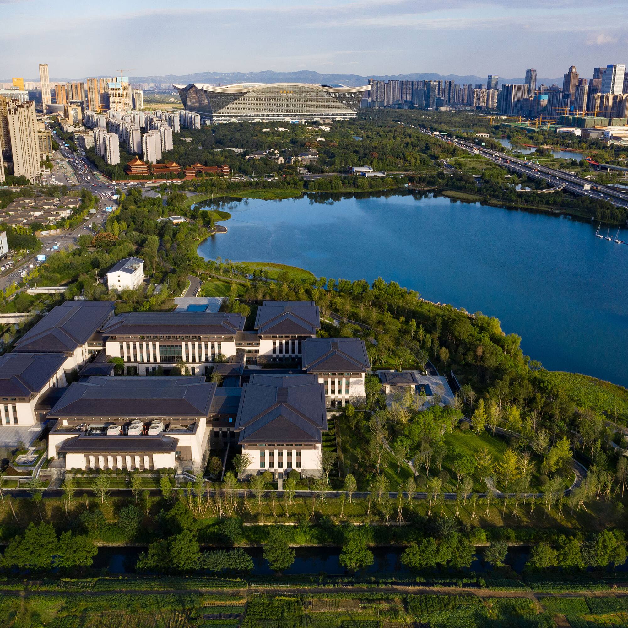 a large building next to a body of water