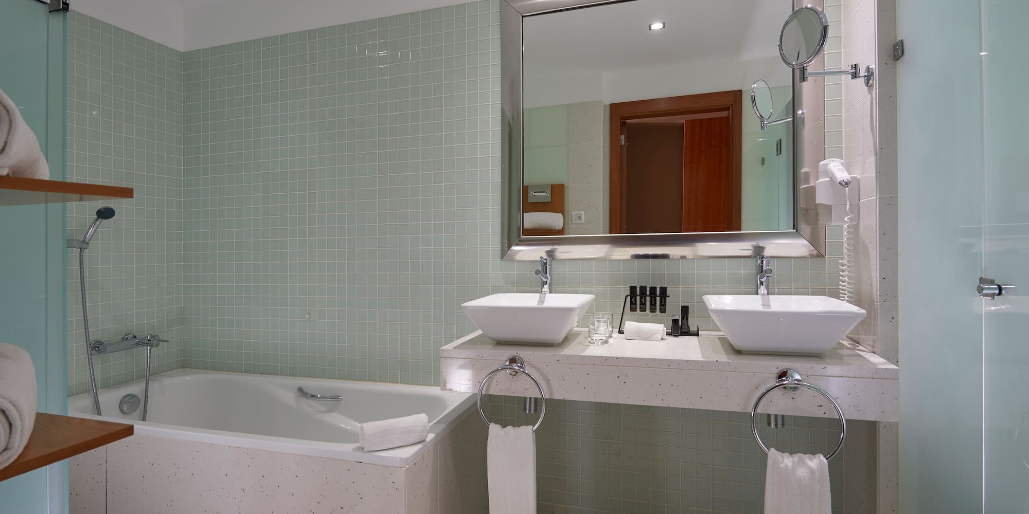 a bathroom with a bathtub and sink