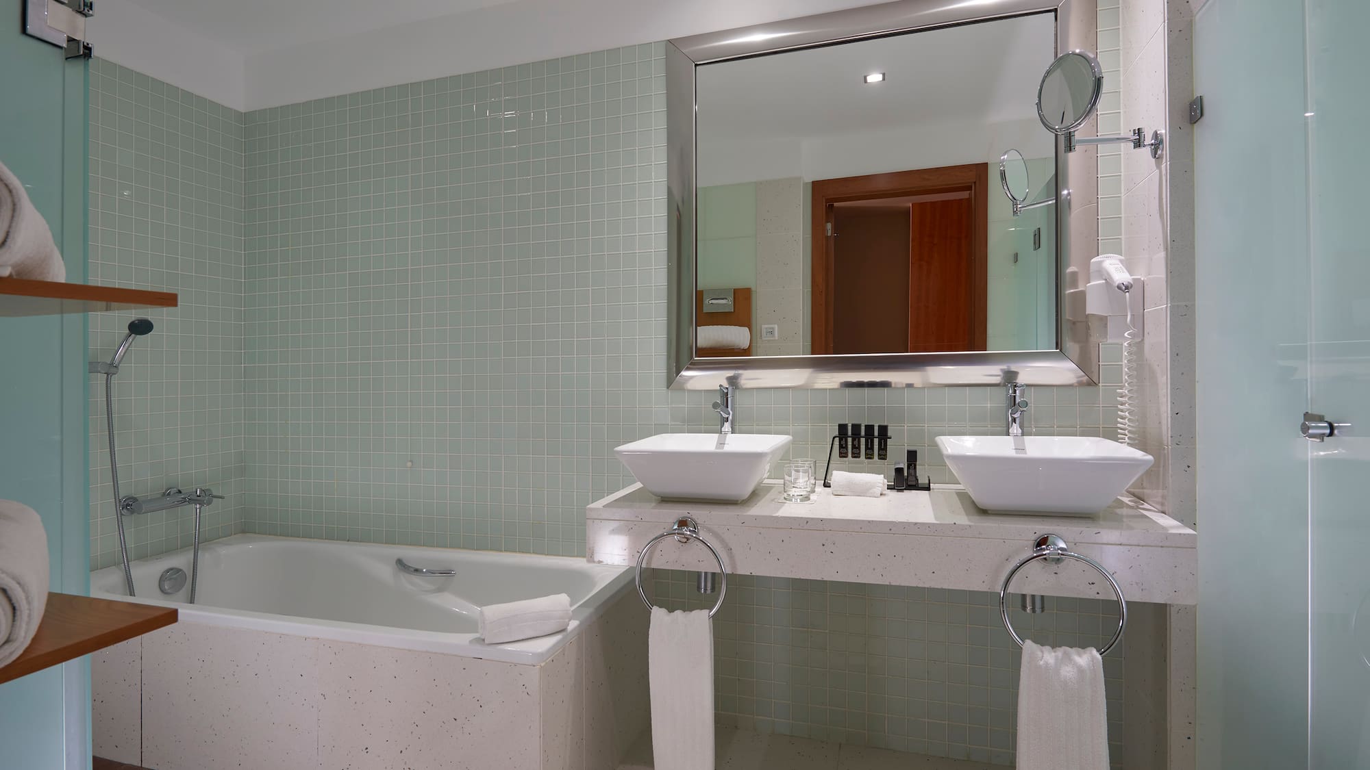 a bathroom with a bathtub and sink