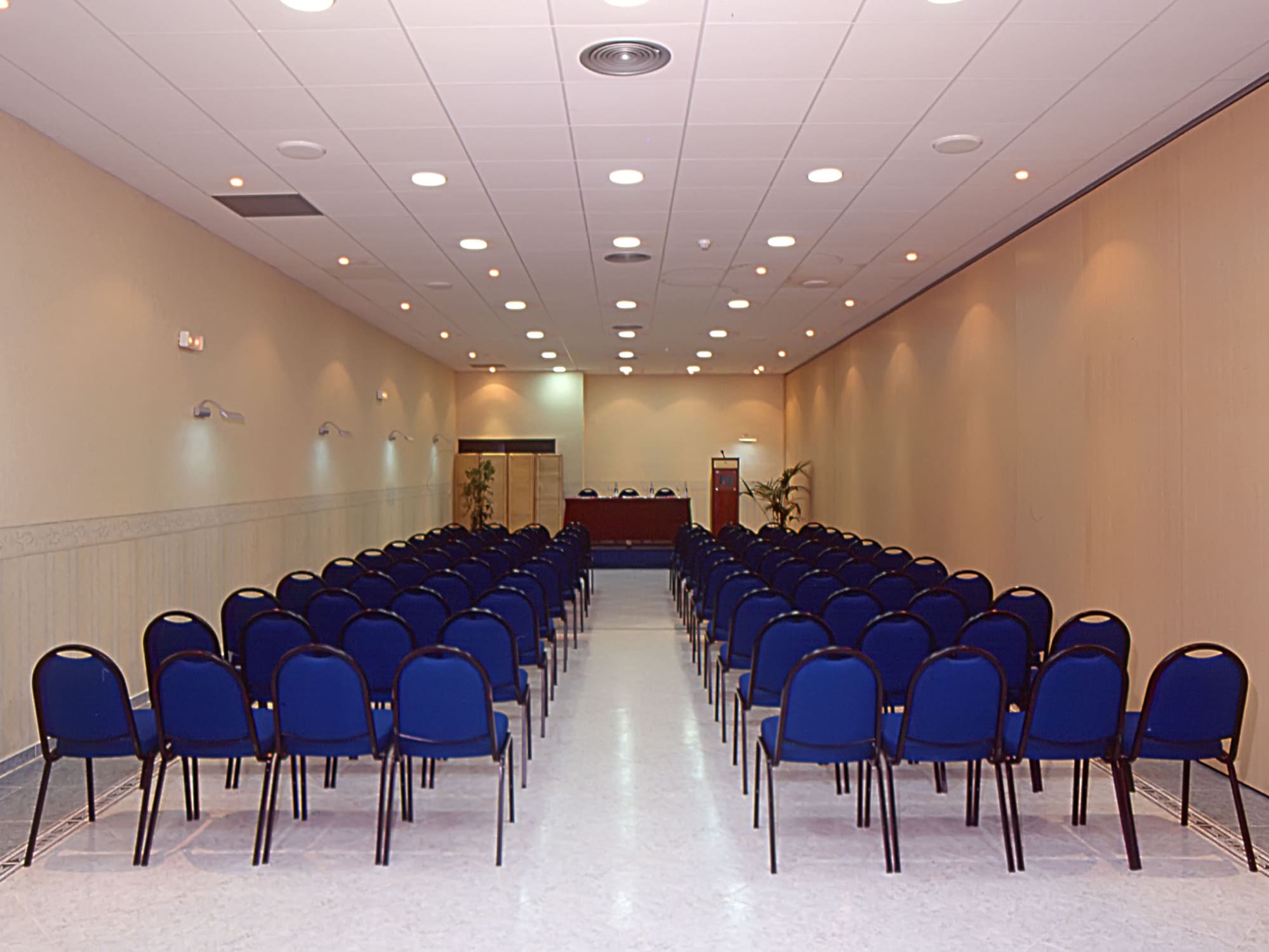 a room with blue chairs