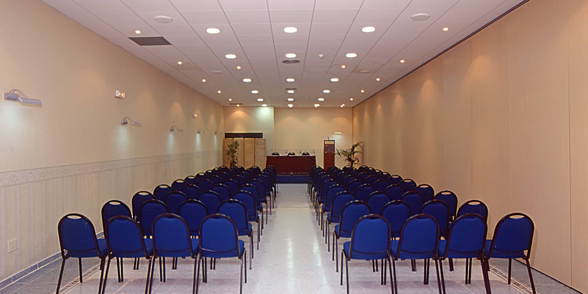 a room with blue chairs