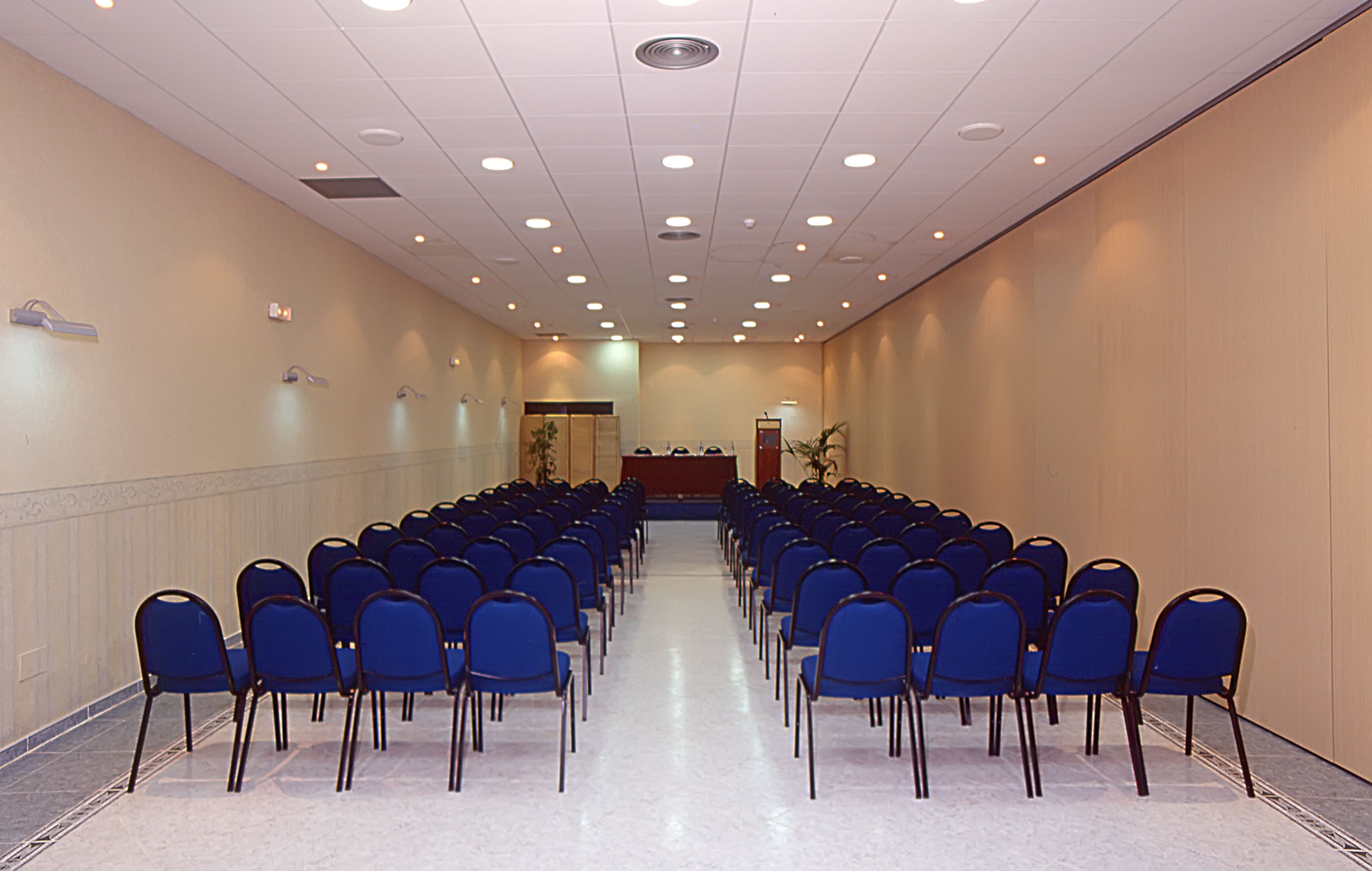 a room with blue chairs