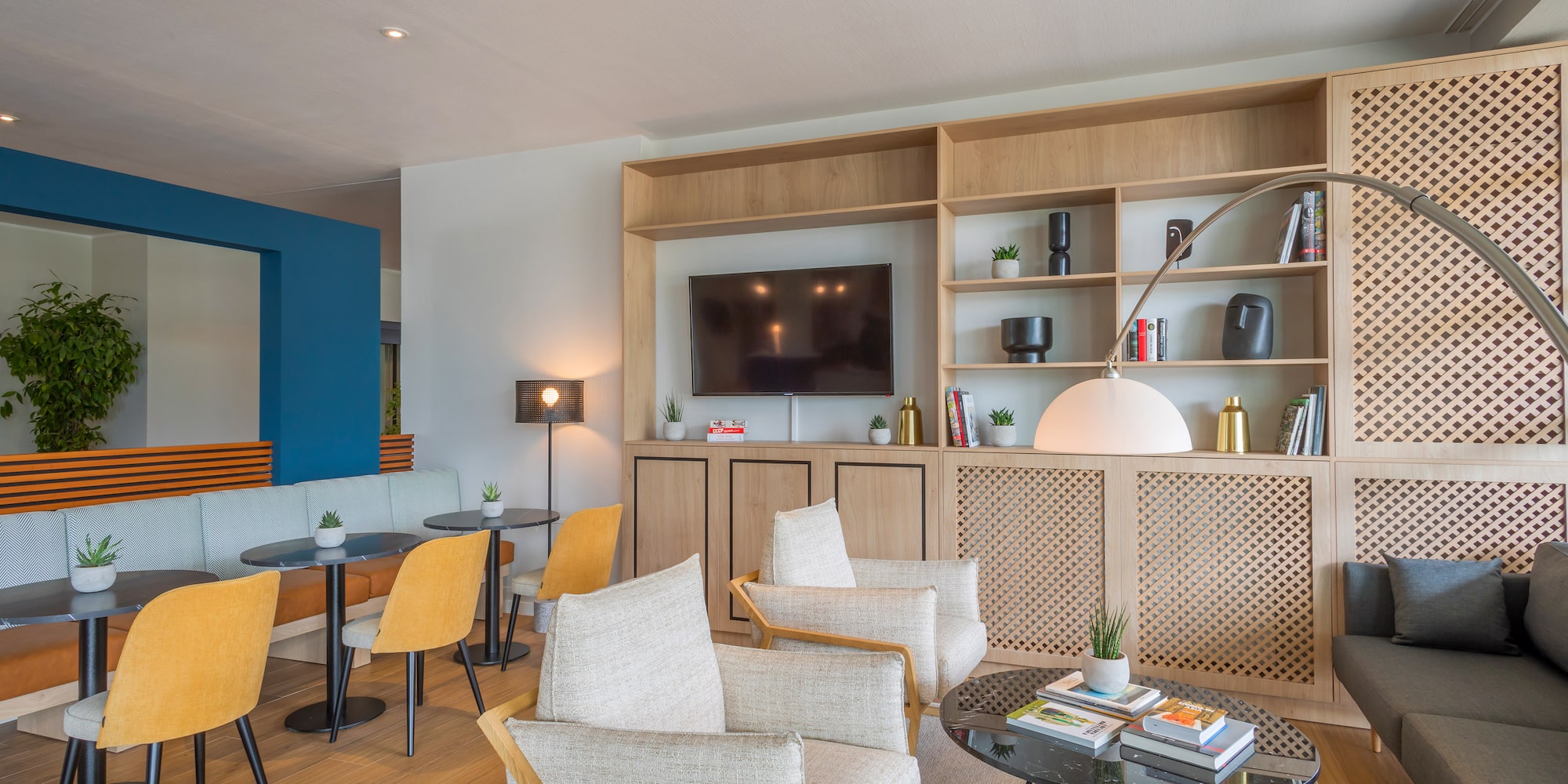 a room with a tv and a couch