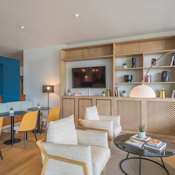 a room with a tv and a couch
