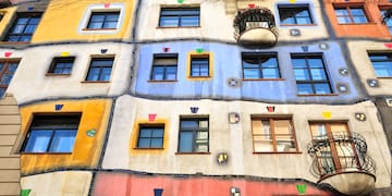 a multi-colored building with many windows