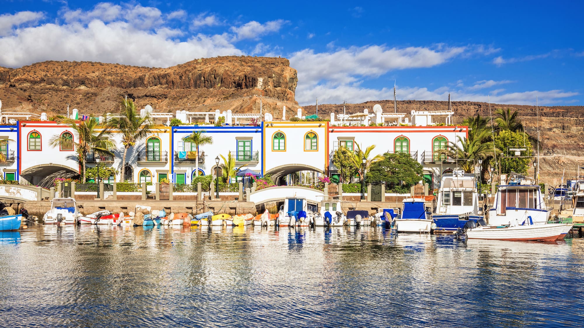 a group of boats in a body of water