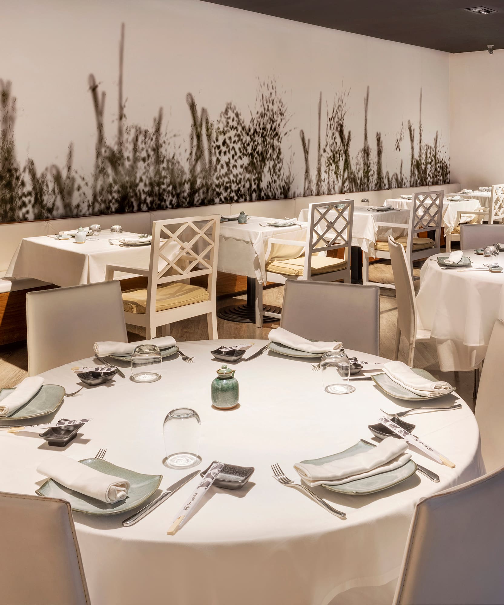 a restaurant with tables and chairs