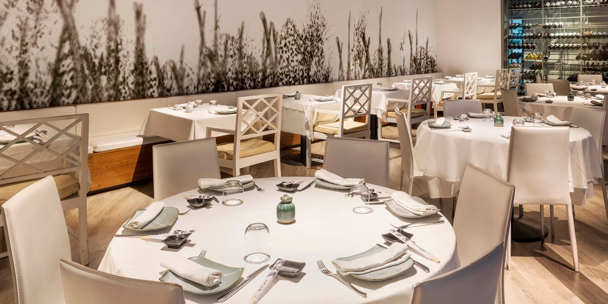 a restaurant with tables and chairs