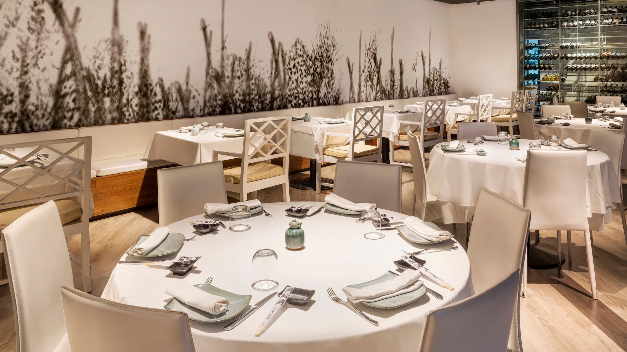 a restaurant with tables and chairs