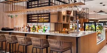 a bar with a bar and bar stools