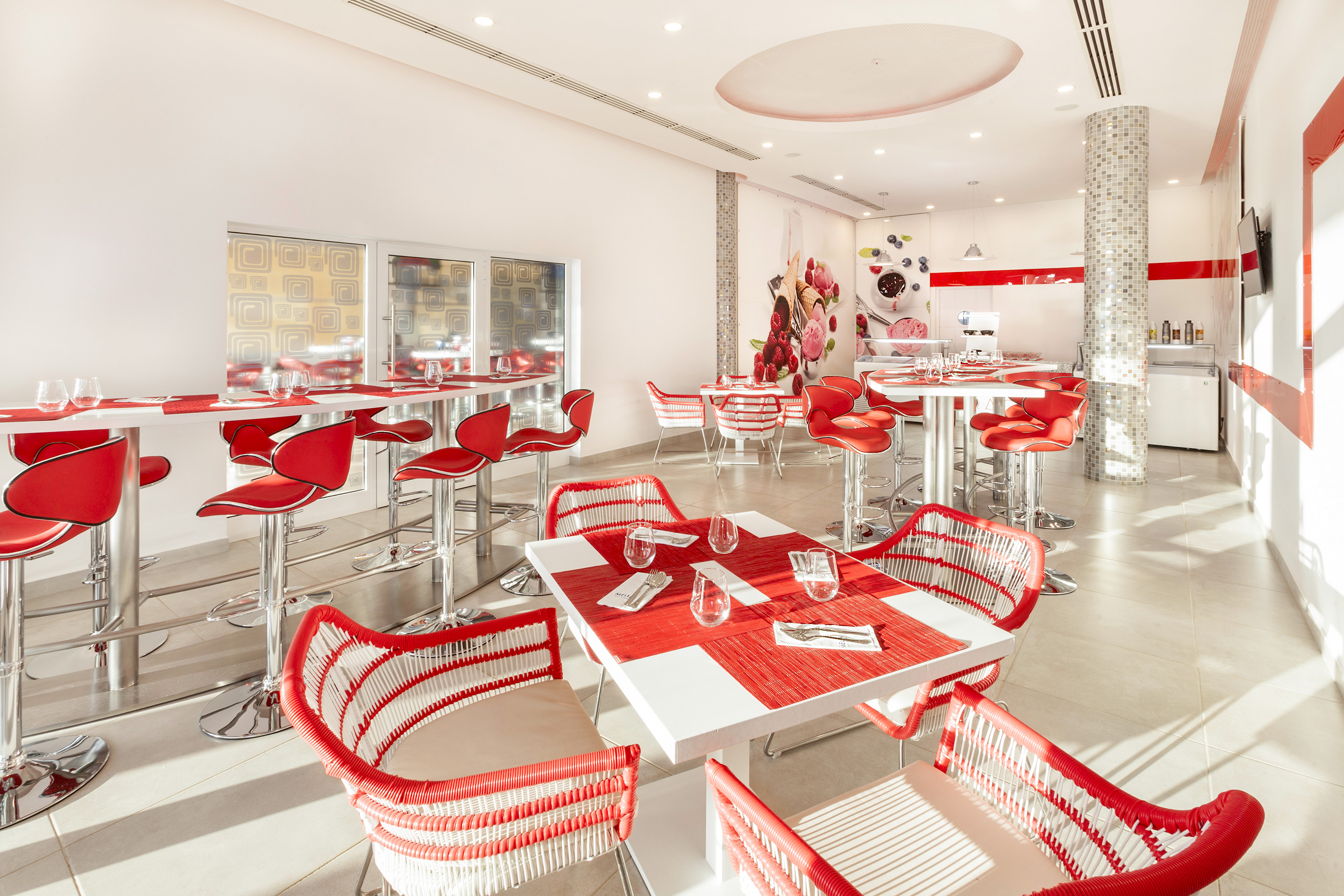 a room with tables and chairs