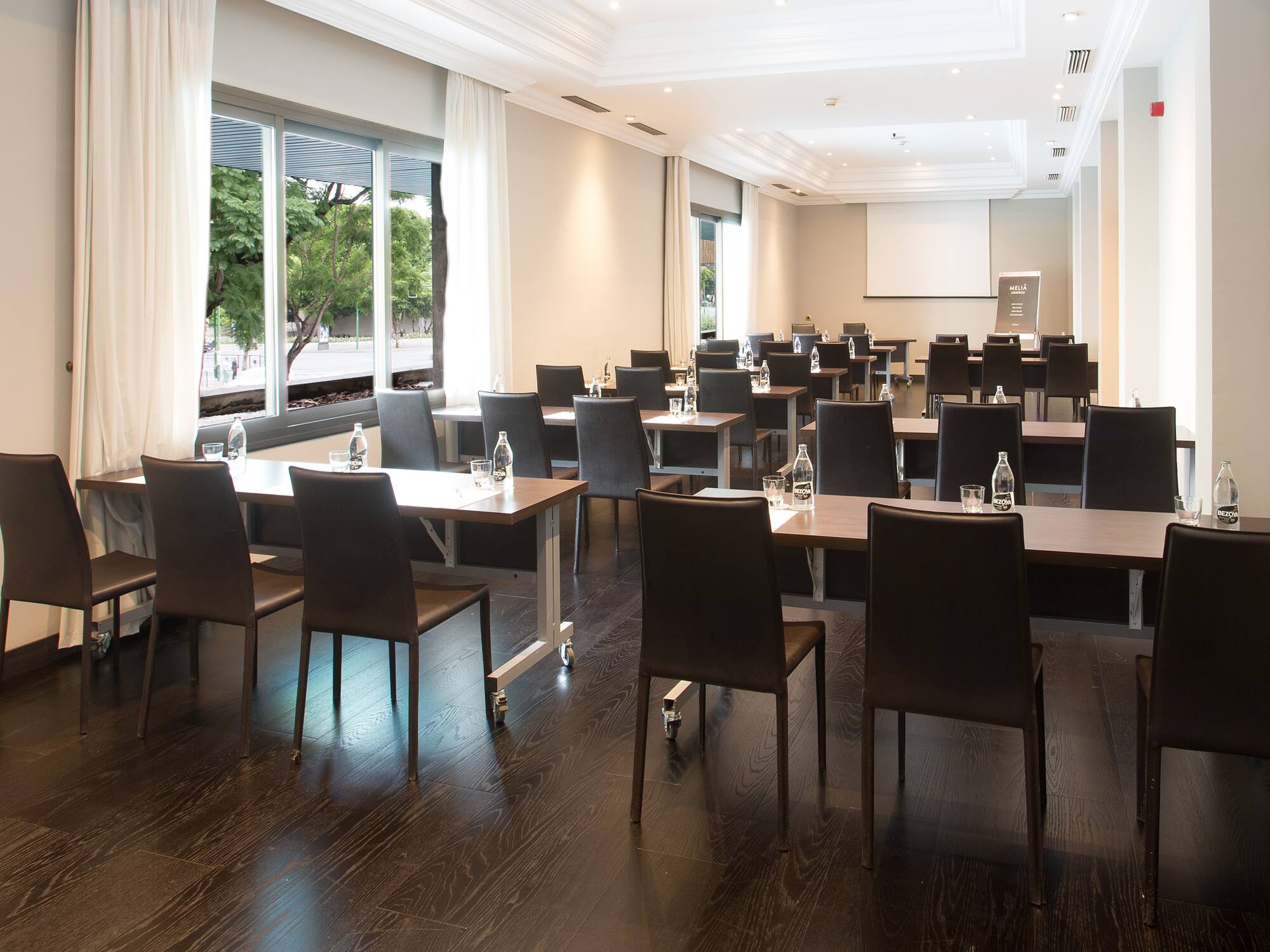 a room with tables and chairs