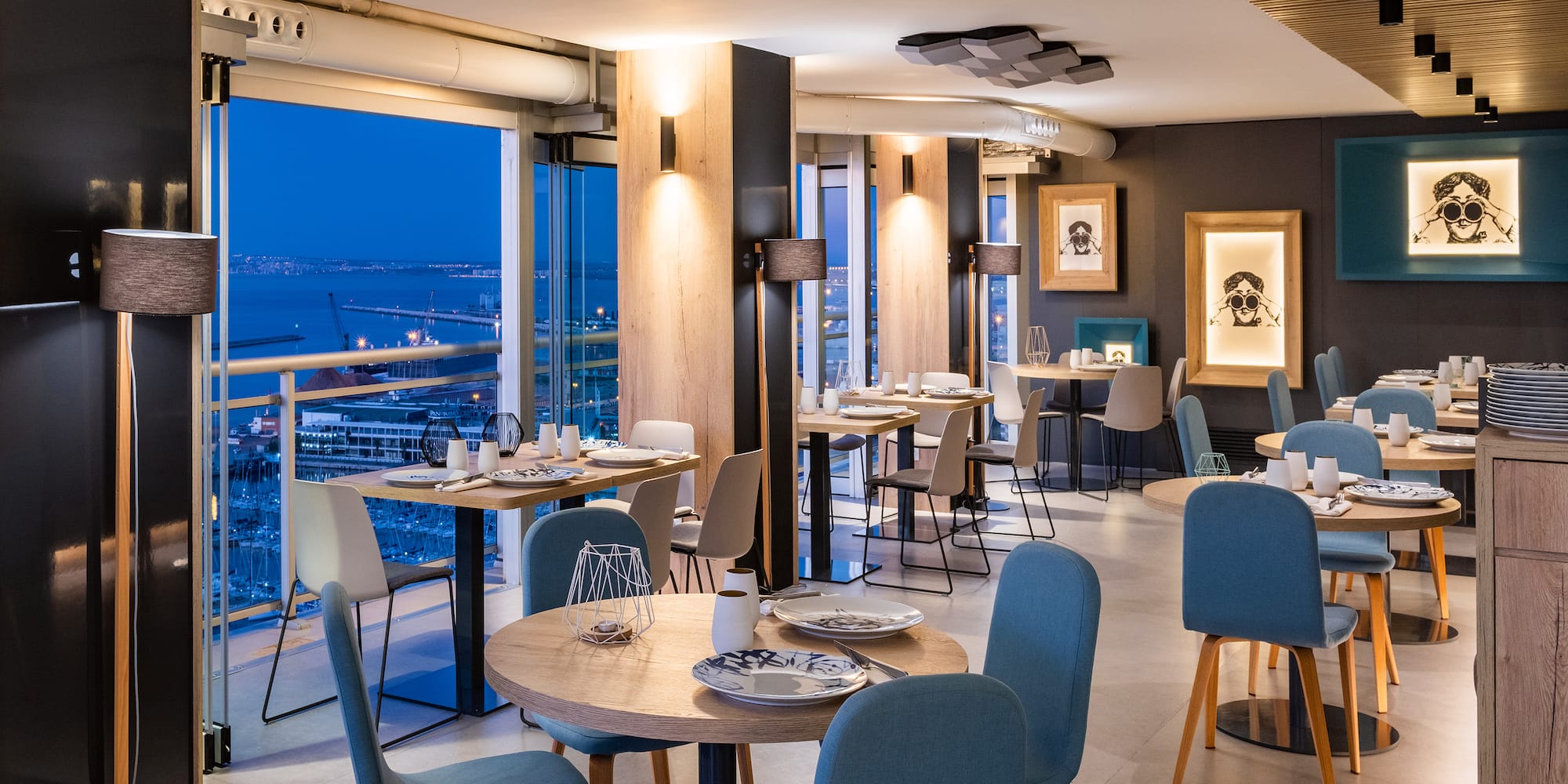 a restaurant with tables and chairs